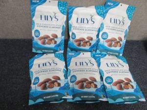 lot 99 image: 6- 3.5 oz Bags Lils Milk Chocolate...