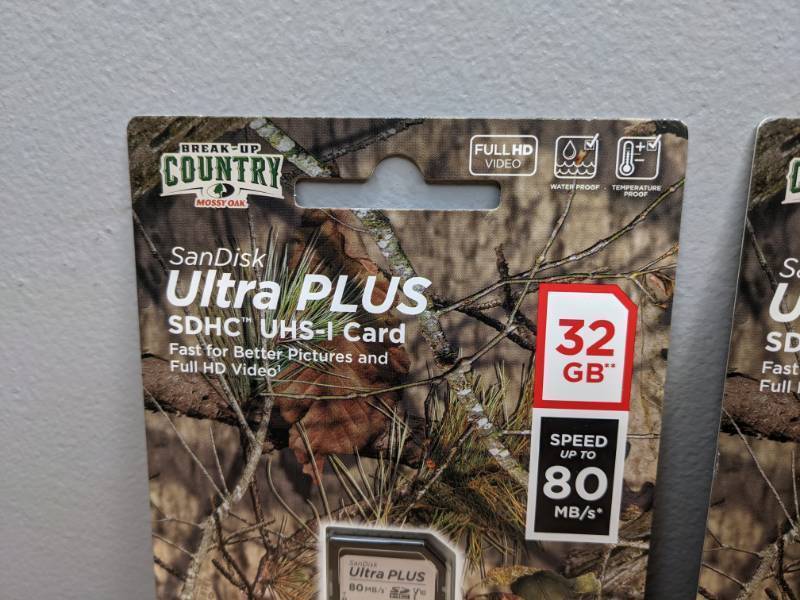 lot 48 image: Set of 3 Brand New SanDisk 32GB Mossy Oak Ultra Plus SD Cards - T