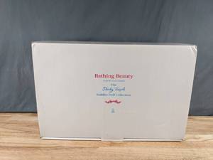 lot 52 image: Vintage The Danbury Mint Bathing Beauty Shirley Temple From The Toddler Doll Collection - X