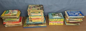 lot 122 image: Large Collection of Vintage Childrens Books Disney, Presidents, Paul Bunyon, Caps for Sale, Garfield and So Much More - X