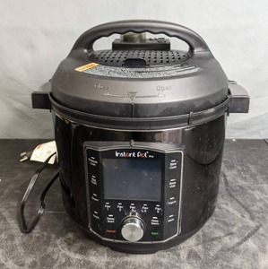 lot 61 image: Instant Pot Pro 10-in-1 6 Quart Pressure Cooker - N