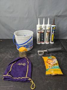 lot 136 image: Assortment of Caulk, Screws, Nuts, Bolts, Hammer Drill Holder, Razors, Crown Royal Bag and More - N