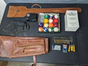 lot 137 image: Collection of Leather Holsters, Ammunition, Quiver, Pool Balls, NFL Packers Mini Vintage Football and More - N