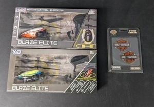 lot 138 image: Lot of 2 Remote Control Helicopters & Harley Davidson Decals - N