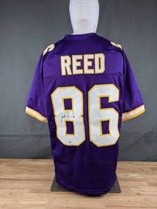 lot 26 image: Jake Reed Autographed Minnesota Vikings NFL Football Jersey 86 XL - N