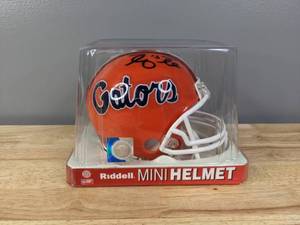 lot 23A image: Tim Tebow and Percy Harvin Autographed Florida Gators NCAA Football Mini Helmet - T