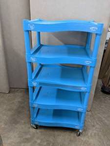 lot 341 image: Banana Boat and Hawaiian Tropical 5-Tier Plastic Cart with Lipped Shelves Display, Blue - X