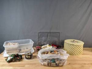 lot 332 image: Assortment of Sewing Supplies Simplicity Patterns, Buttons, Thread, Embroidery Hoops, Darning & Mending Yarn, Patches, Fabric Menders and More - V