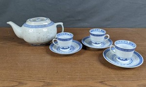 lot 427 image: Blue and White Teapot and 3 Coordinating Tea Cups with Saucers - V