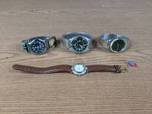 lot 404 image: Lot of 4 Mens Watches 3 Stretch Band (Dakota, Milan, Other), 1 Leather Band - V
