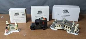 lot 363 image: Heritage Village Collection Dept 56 Porcelain Accessories Village Sign with Snowman, Village Express Van, and Lionhead Bridge - V