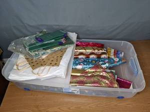 lot 397 image: Bin of Assorted Wrapping Paper, Tissue Paper, and Gift Bags - V
