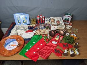 lot 398 image: Holiday Decor (Ornaments, Nativity Flags, Snowman and Santa Decor, Wooden Plate, Wine Bottle Bags, and more) - V