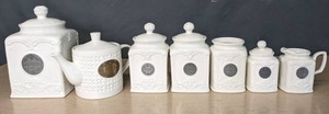 lot 418 image: 13-Piece Collection of White THL Ceramics Canisters, Teapot, Sugar & Creamer, Pitcher and More - V