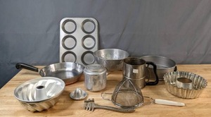 lot 366 image: Assortment of Kitchen Items Bunt Pan, Strainers, Juicer, Round Spring Form and More - V