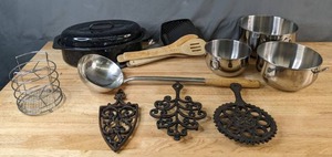lot 367 image: Assorted Kitchen Items Cast Iron Trivets, Stainless Steel Mixing Bowls, Roasting Pan, Spoon Holder and More - V