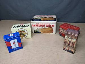 lot 544 image: Assortment of (5) Vintage Decorative Tins National Biscuit Shredded Wheat, C.W. Post Family Style Cereals, Churchills Confectionery London Transport and More - V