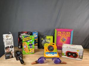 lot 526 image: Assortment of Games Yahtzee, Throw n Go Jenga, Picture Picture, Whats That Smell, Socker Boppers, Pop Solo and More - V