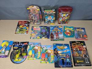 lot 547 image: Vintage Collection of (14) Unopened Action Figures Baron Dark, Dvertkill, Chun Li, Young Robin Hood, Hook Launchin Danny, Hannah Dundee, Lt. Kawalsky, Belle, Iron Man 2 Build & Display and More - V