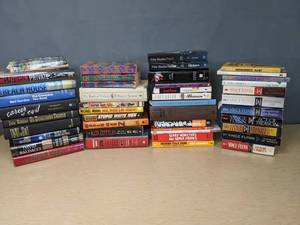 lot 579 image: Collection of (44) Story Books Harry Potter, New Moon, World War Z, The Beach House, Career of Evil and More - V