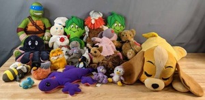 lot 613 image: Collection of Stuffies Toys Ninja Turtle, Doughboy, Jolly Green Giant Sprout, Garfield, and Many More - V
