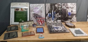 lot 663 image: Large Group of Decorative Items Wine Wall Art, Signs with Quotes & Sayings, Photo Frames, and More - V