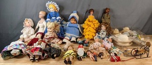 lot 655 image: Large Collection of Dolls Barbie, Precious Moments, Kewpie Doll, International Dolls, Crocheted Clothes & More - V