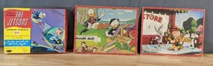 lot 633 image: Lot of 3 Fun Vintage Puzzles, The Jetsons, Donald Duck and Bugs Bunny - V