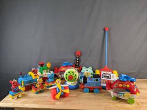 lot 604 image: Vintage Collection of Kids Toys Disney Show Boat, Cash Register, Leap Frog Baby, Elmo Express and Much More - V