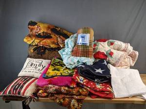 lot 597 image: Assortment of Lovesac, Throw Blankets, Pillows, Sleeping Bags and More - V