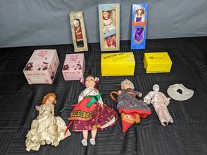 lot 719 image: Collection of Dolls and Doll Wigs Anastasia, Kim, Cavalry Lifeguard Bugler, Bell Doll Wigs and More - W