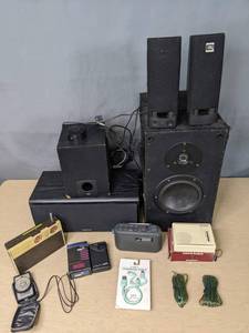 lot 703 image: Assortment of Electronics Speaker System, Radios, Cables and More - V