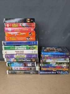 lot 733 image: Assortment of Kids VHS and DVD Cats Dont Dance, Tangled, Shrek, Little Rascals, The Little Mermaid, Flubber and More - V