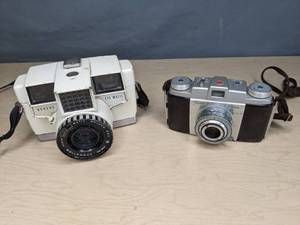 lot 683 image: (2) Vintage Cameras Kodak Pony 135 and Revere Eye-Matic E127 - V