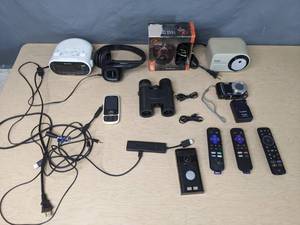 lot 692 image: Assortment of Miscellaneous Electronics Camera, Lumix Dmc-T25, Plantroincs, Amazon Fire Stick and More - V