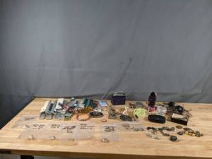 lot 679 image: Collection of Costume Jewelry Rings, Bracelets, Belt Buckle, Reading Glasses, Watch Straps and More - V