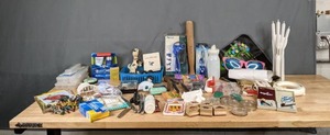 lot 709 image: Miscellaneous Assortment of Storage Containers, Night Lights, Pocket Knifes, Stamps, Pencil Engraver and More - V