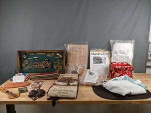 lot 711 image: Miscellaneous Assortment of Vintage Decoration Silk Military Pillow Cover, Paper Cast, Banner, Bird House, Basket and More - V
