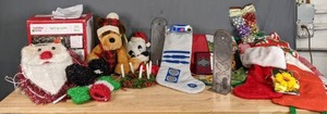 lot 751 image: Christmas Lot Light-Up Santa, Stockings, Ornaments, Gift Bags and More - V