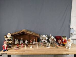 lot 737 image: Collection of Christmas Figurines Santa, Snowmen, Bears, Nut Cracker, Manger, Village Houses and More - V