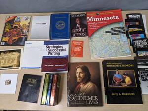 lot 800 image: A Collection of Books, Travel Map, MN Legislative Manuel, and Nintendo Booklets - V