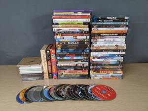 lot 738 image: Approx. 90 CDs, DVDs, VHS Tapes and Blu-Rays The Devil Wears Prada, Lord of the Rings, Childrens Movies & More - V