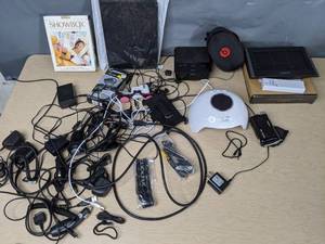 lot 740 image: Showbox Photo Viewer, Nail Lamp, Bell & Howell DVD200HD Digital Camera, Loads of Cables & Cords, & More   - V