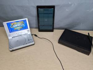 lot 741 image: Funai DVD Player, Polaroid Portable DVD Player, Amazon Fire Tablet - V