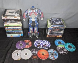 lot 760 image: Collection of DVDs, Games for PS2, PS3, PS4, XBox and PC Special Edition Transformers Optimus Prime DVDs - N