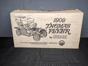 lot 763 image: 1909 Thomas Flyer Decanter by Beam Co. in Original Box - V