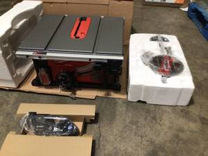 Milwaukee M18 FUEL ONE-KEY 18- volt Lithium-Ion Brushless Cordless 8-14 in. Table Saw Kit W (1) 12.0Ah Battery & Rapid Charger In Good Conditions