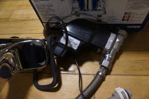lot 23 image: Motion Activated Faucet Complete With Valves and Motion Sensor