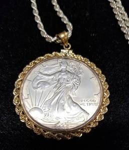 2015 AMERICAN SILVER EAGLE IN A STERLING SILVER NECKLACE