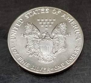1987 AMERICAN SILVER EAGLE 1 TROY OZ .999 FINE SILVER DOLLAR